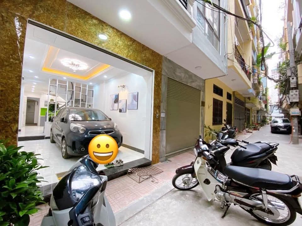 Bán Gấp - Nhà mặt ngõ Cù Chính Lan, ô tô đỗ cửa, 53m2, 4 tầng, 9 tỷ.