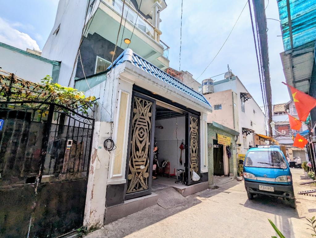Quận 7 bán nhà kế Phú Mỹ Hưng, hẻm xe hơi tới, sổ hồng, gần 80m2, nhỉnh 7 tỷ
