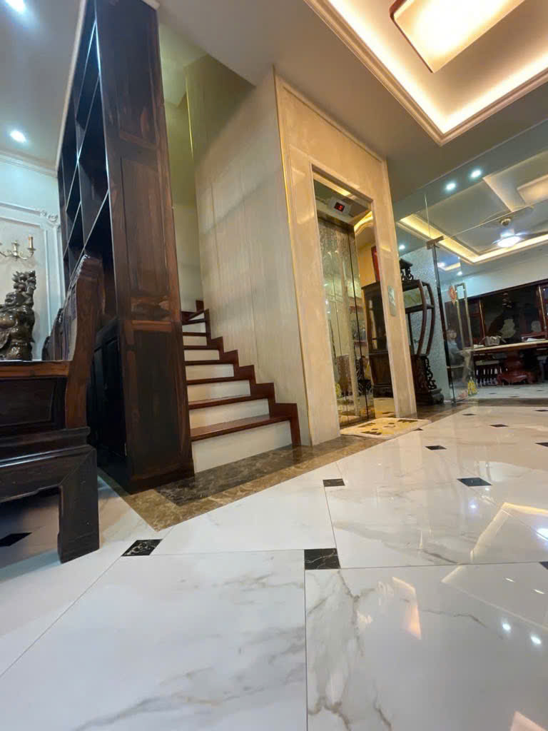 Bán nhà Đoàn Thị Điểm, oto, lô góc, kinh doanh, 75m2, 6T 23,2 tỷ