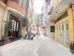 TRUNG TÂM QUẬN ĐỐNG ĐA-lô góc 2 mặt thoáng vĩnh viễn sân để xe cực rộng